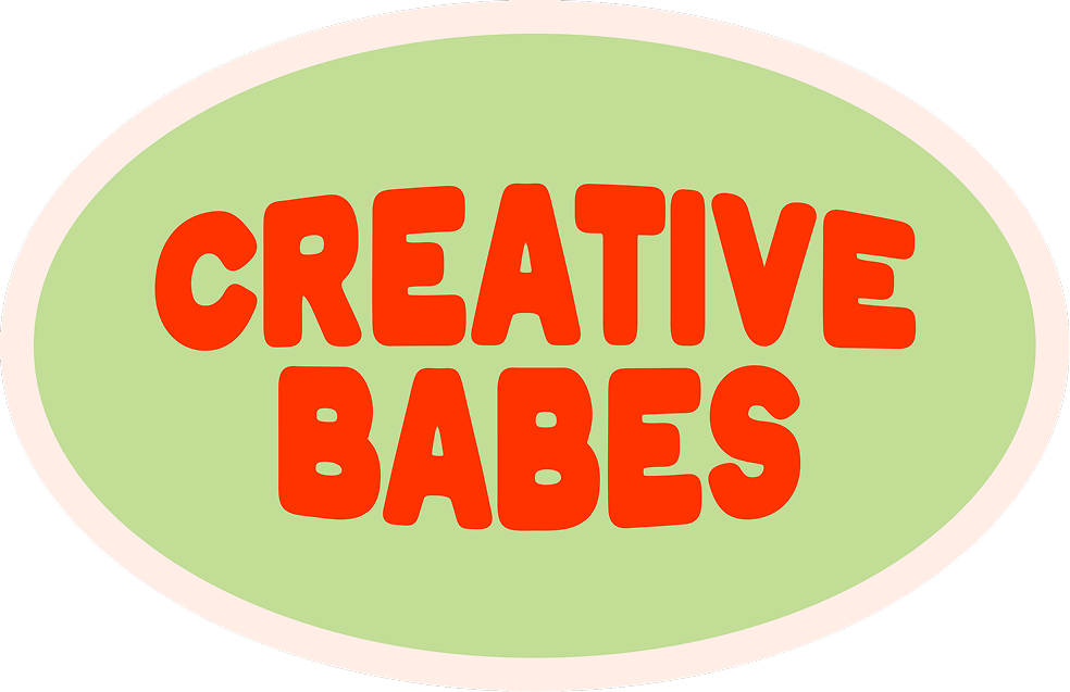 Logo with the words "Creative Babes" in bold red letters inside an oval with a light green background and a white border.