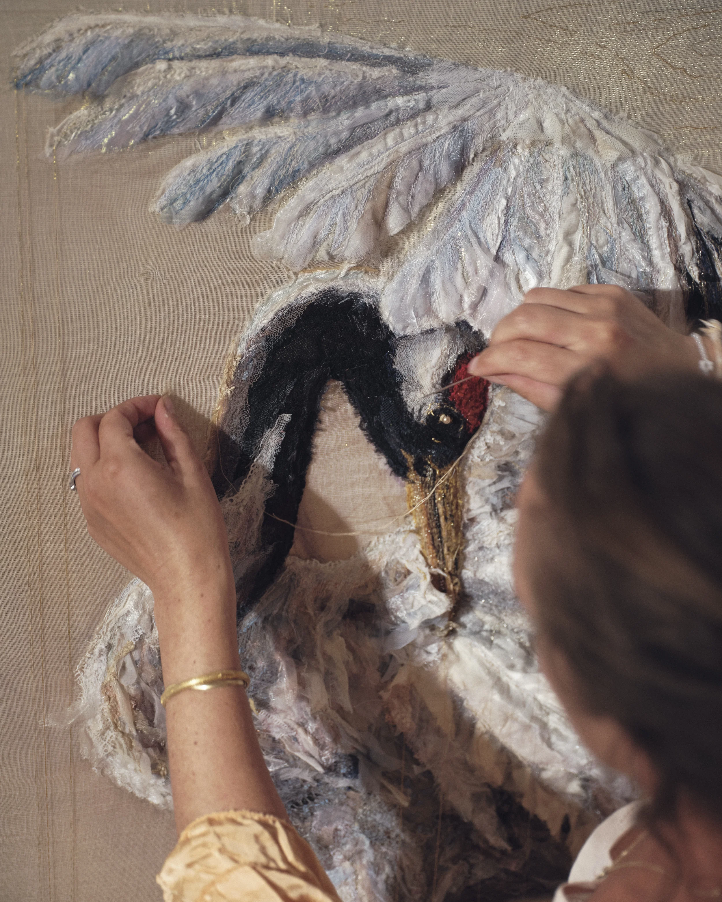 Amy Martin Working on an textile artwork