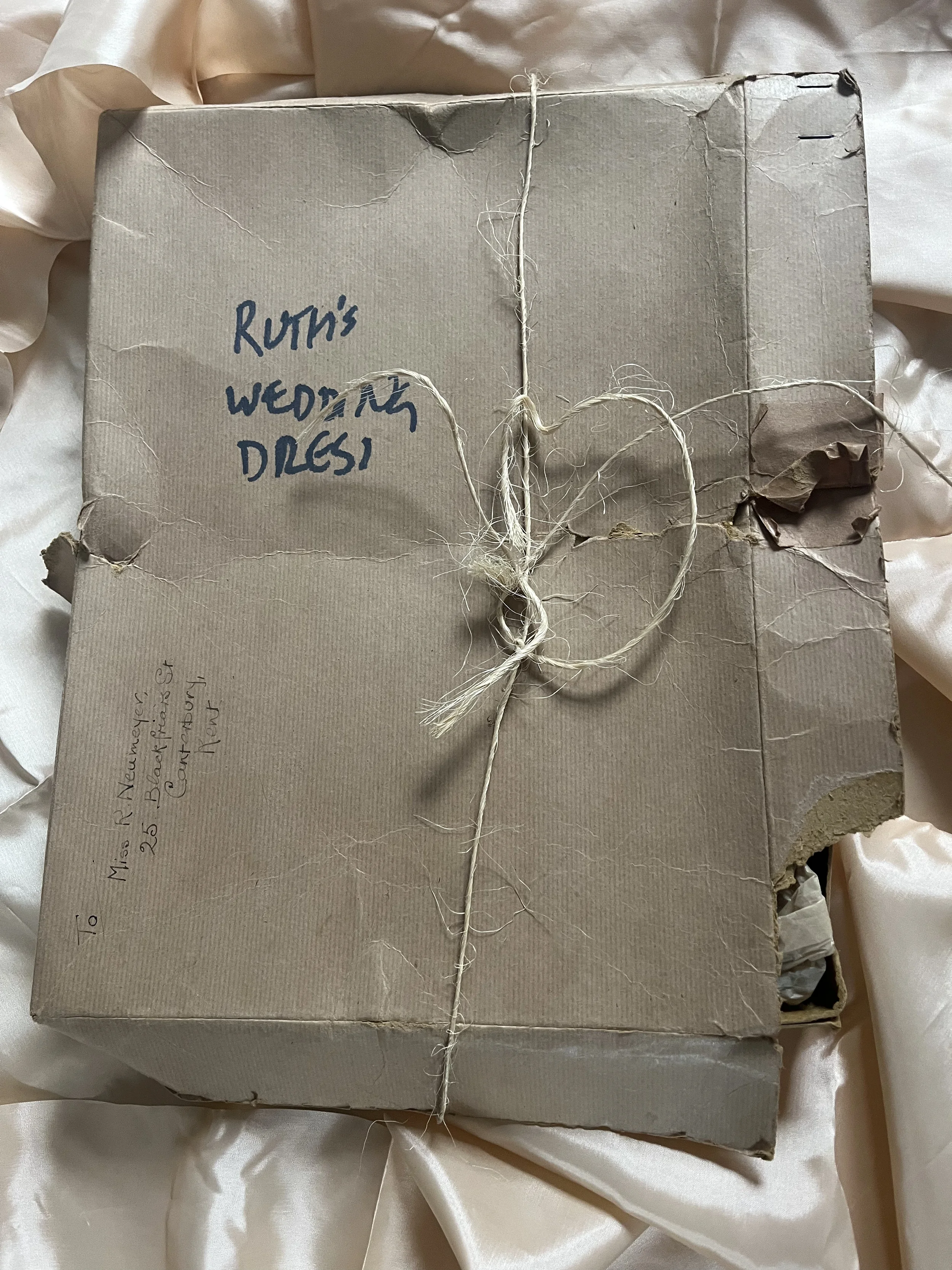 original brown box and string for storing the 1951 wedding dress and floral headdress