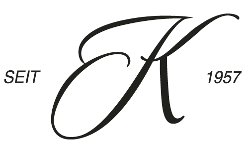 Schwarzes Logo mit großen K und klein geschriebenen Worten 'SEIT 1957'.
