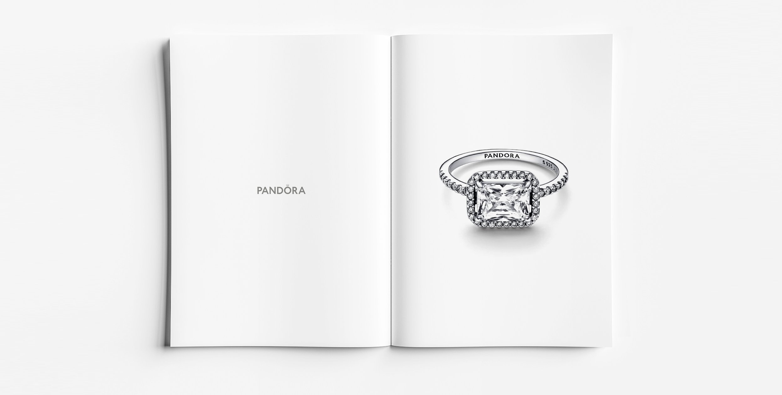 Pandora Pavé collection halo engagement ring design featuring a square radiant cut centre stone with pavé diamond band, luxury jewellery design and development by Myles Day Jewellery Artist.