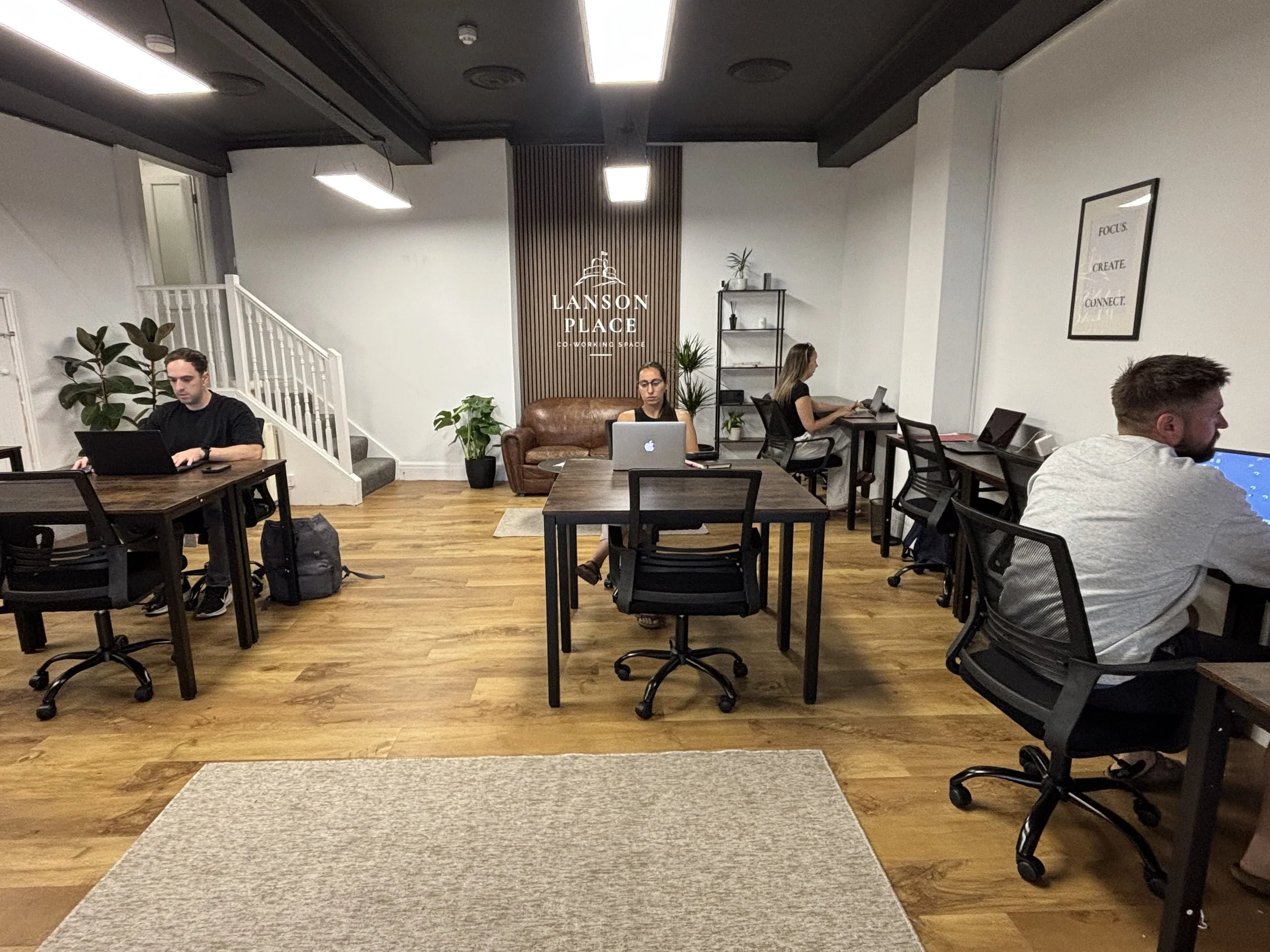 Bright coworking space with desks at Lanson Place in Launceston.