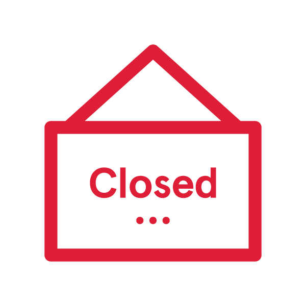 Red hanging sign with the word "Closed" in the center.