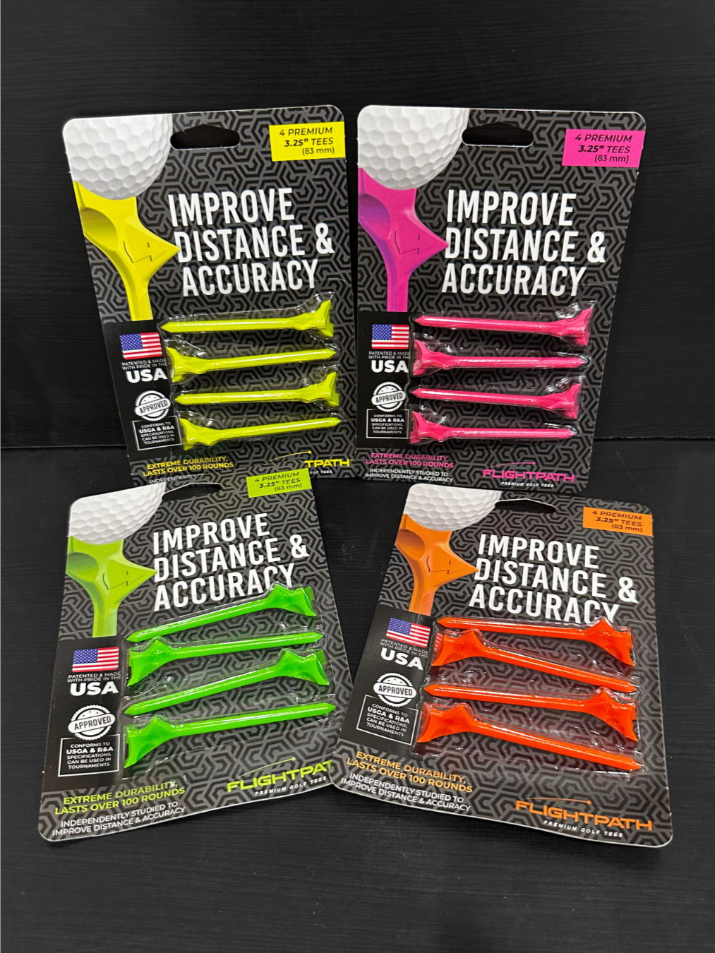 Close-up of a beauty product display including eyelash cosmetics, mascara, and a makeup tool in packaging.