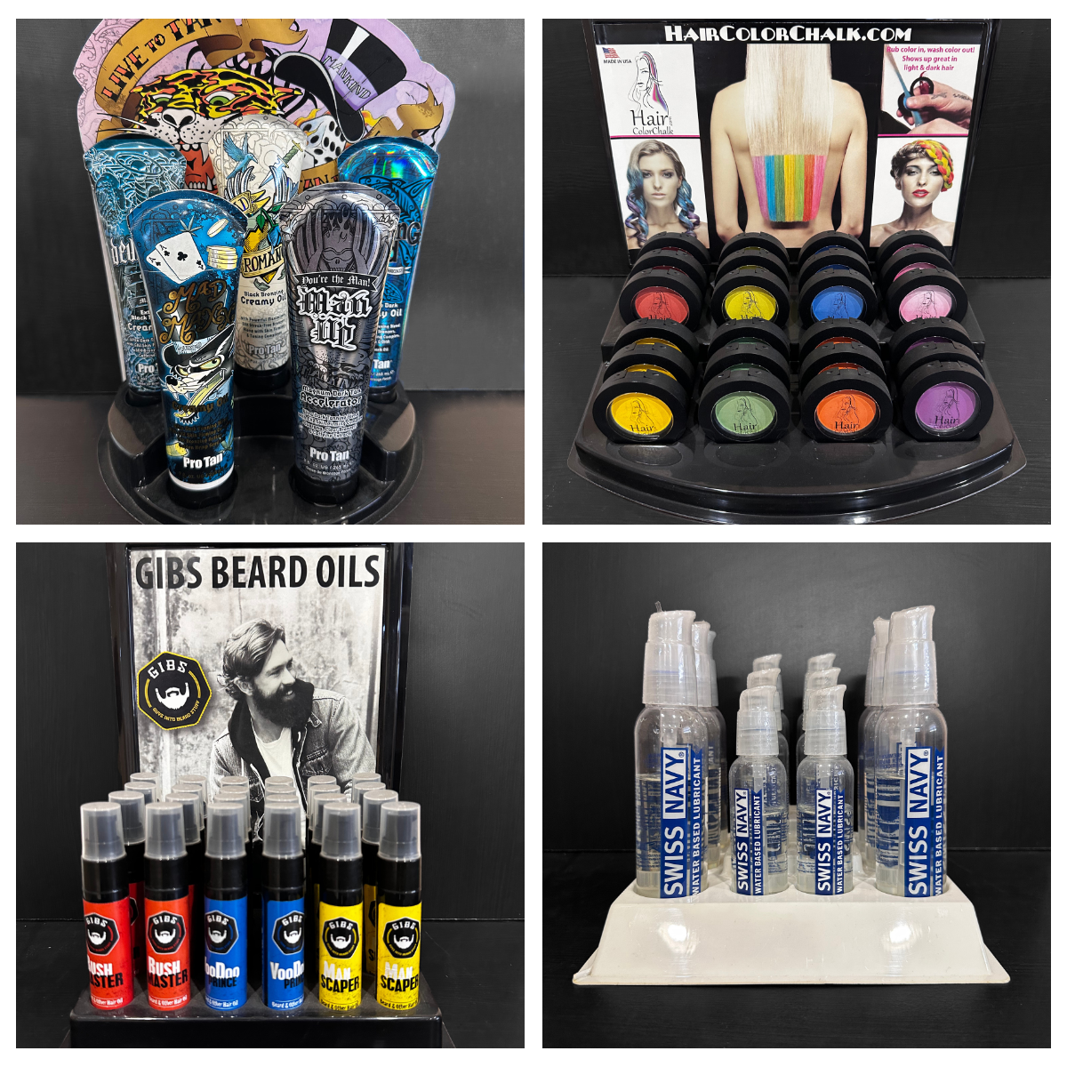 Assorted tattoo and hair dye products, beard oils, and lubricants displayed on black shelves at a store.