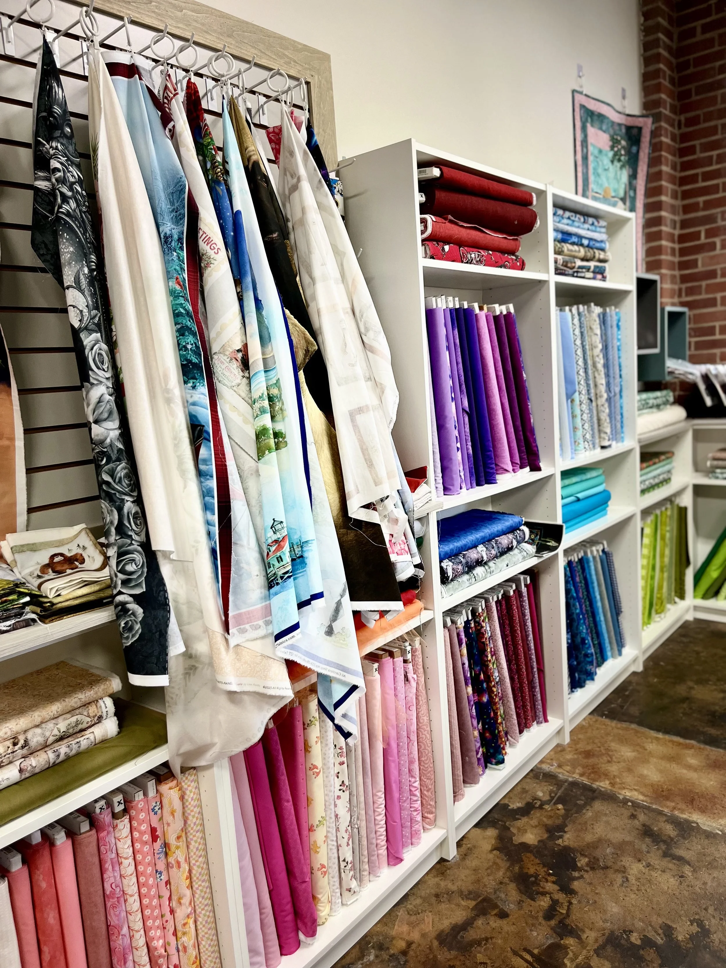Shelves with bolts of fabric