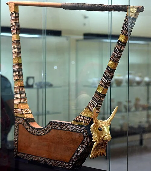 The_Queen's_gold_lyre_from_the_Royal_Cemetery_at_Ur._C._2500_BCE._Iraq_Museum.jpg