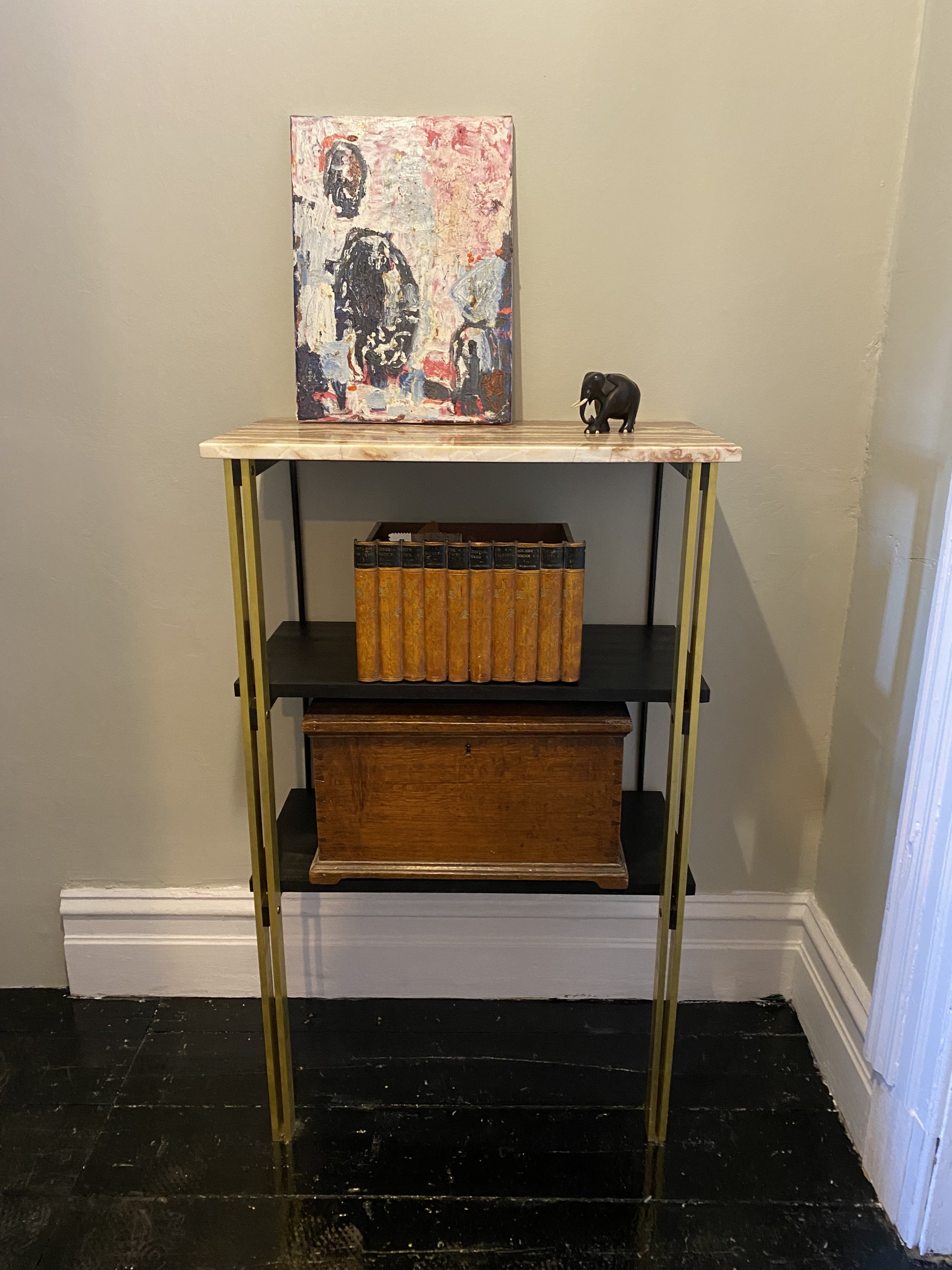 The petite $2,200 onyx top