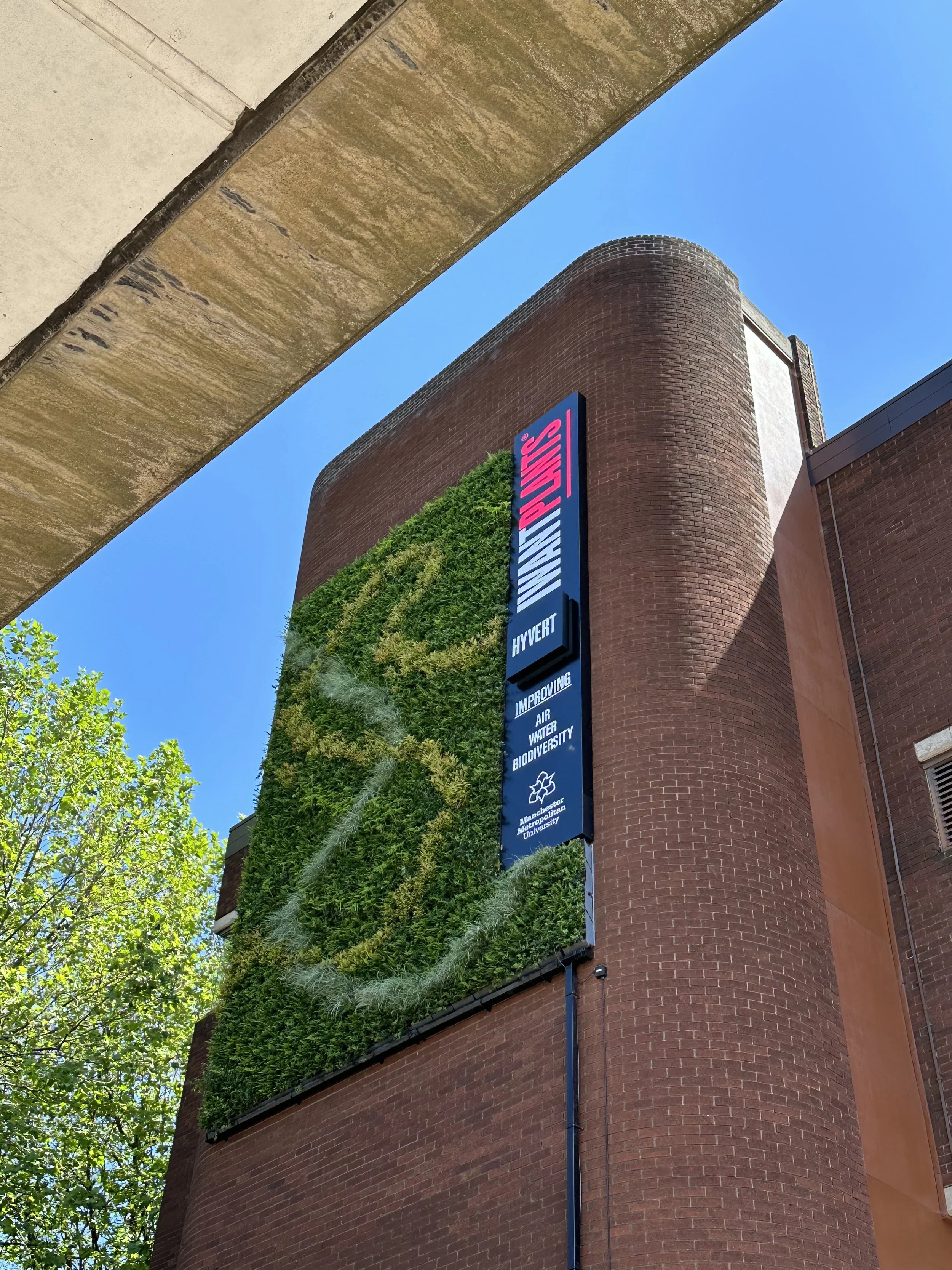 plant feature wall on side of Manchester Metropolitan University building