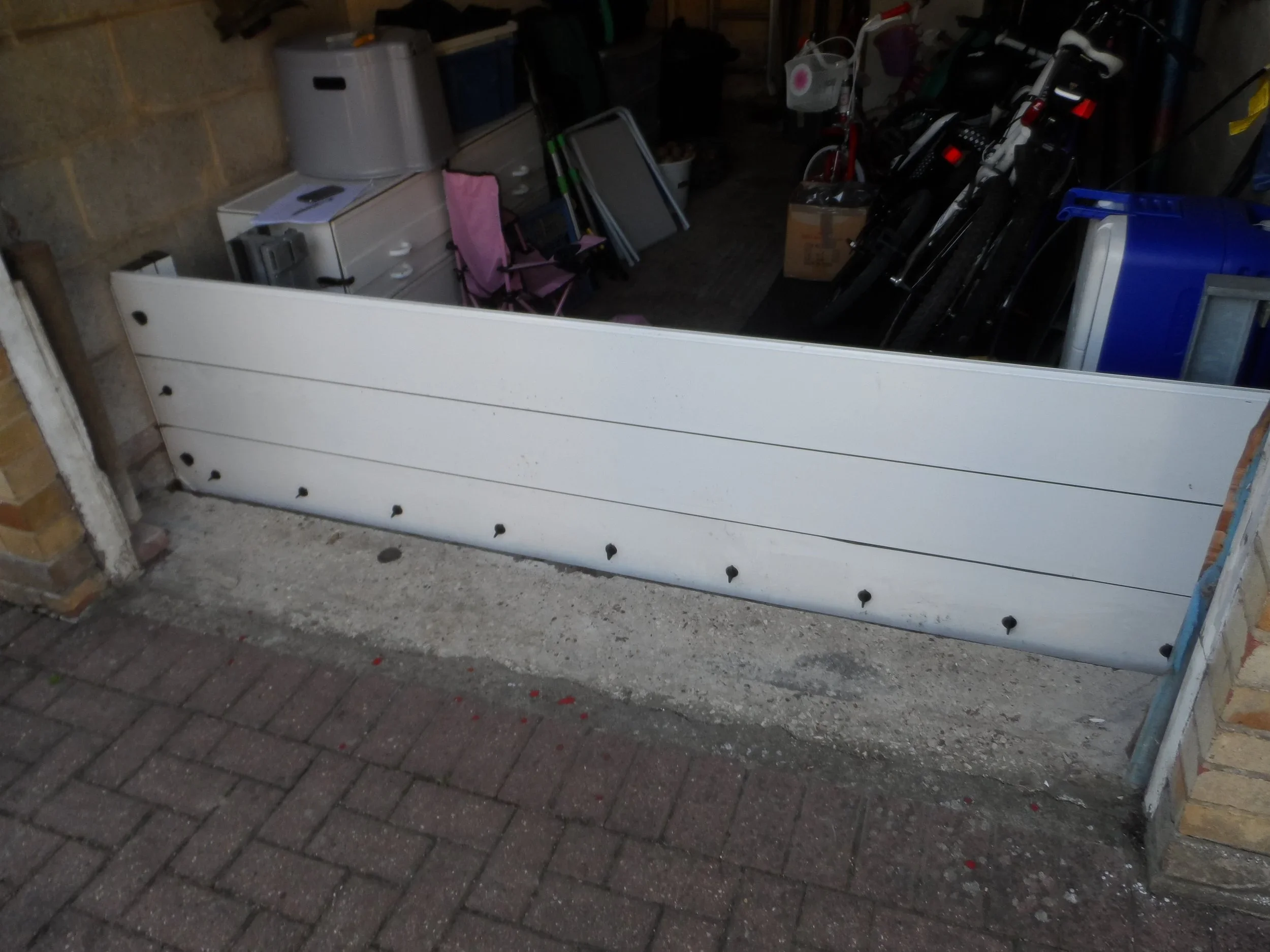 Garage flood barrier