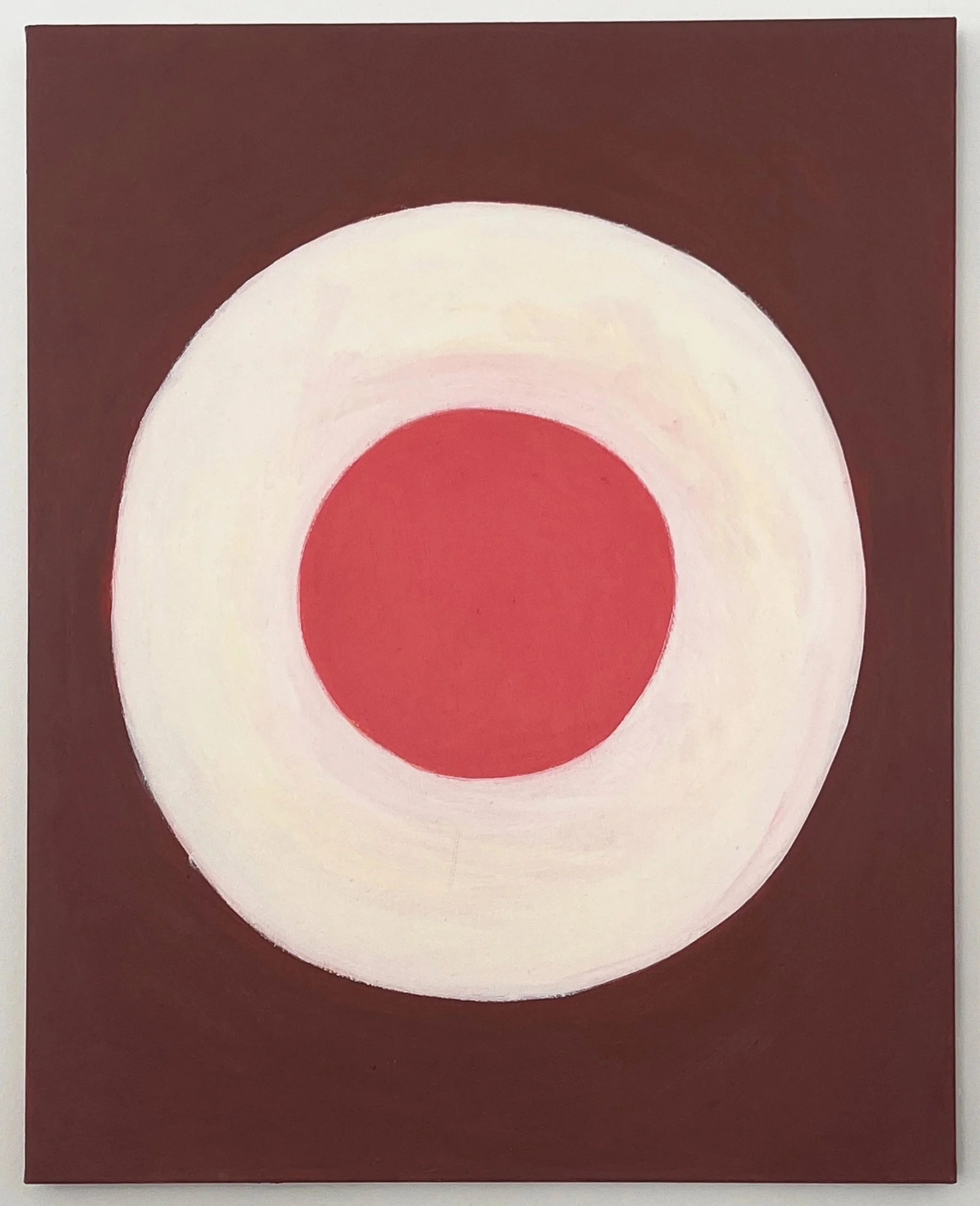 Abstract painting with concentric circles in red, white, and brown.