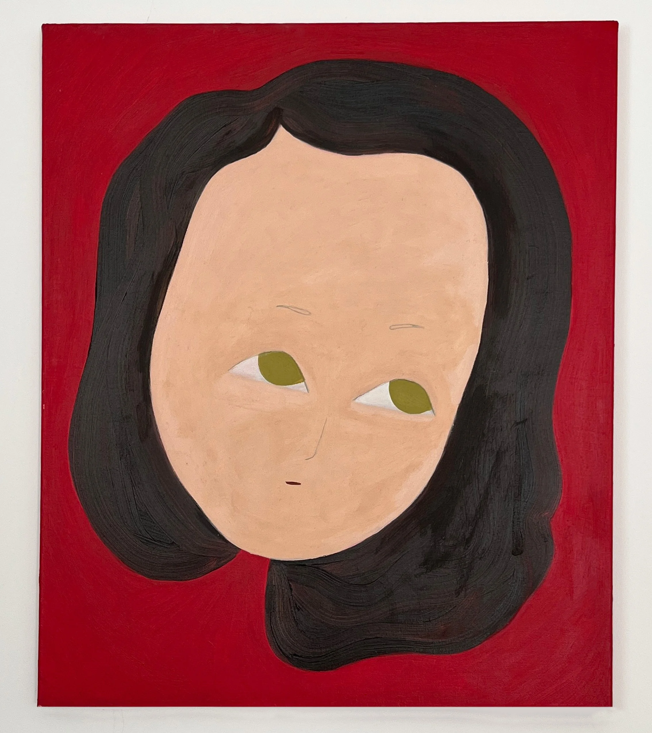 A painting of a person's face with large, green eyes, light skin, and dark hair against a red background.