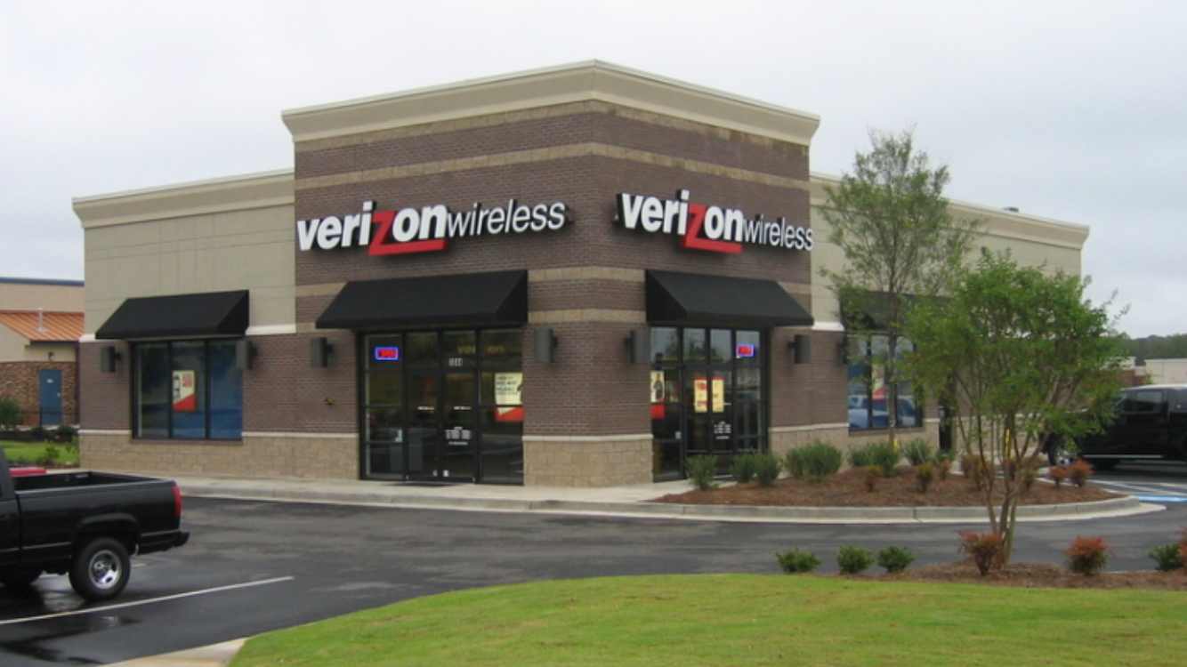 Verizon Wireless store exterior with signage, windows, and parking lot.