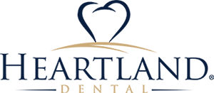 Heartland Dental logo with a heart-shaped graphic above the text