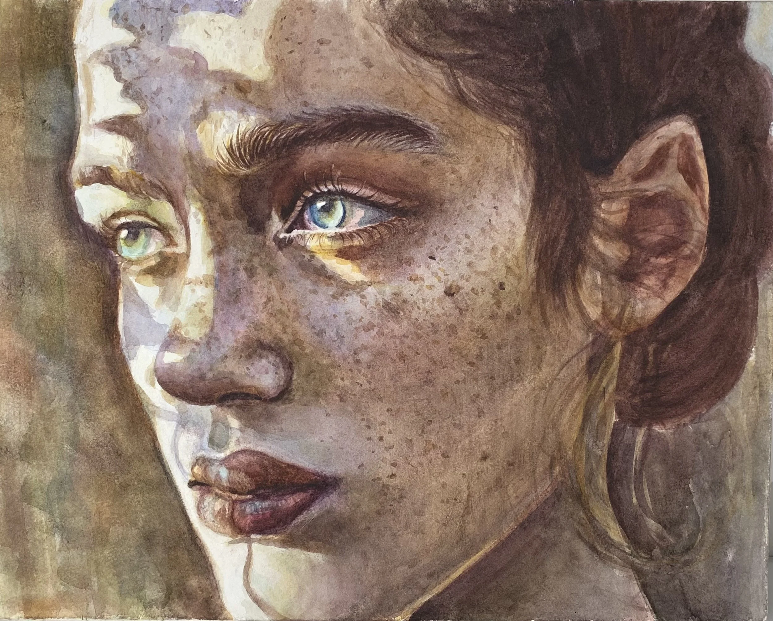 Close-up of a woman's face with blue eyes, freckles, and brown hair, watercolor style.
