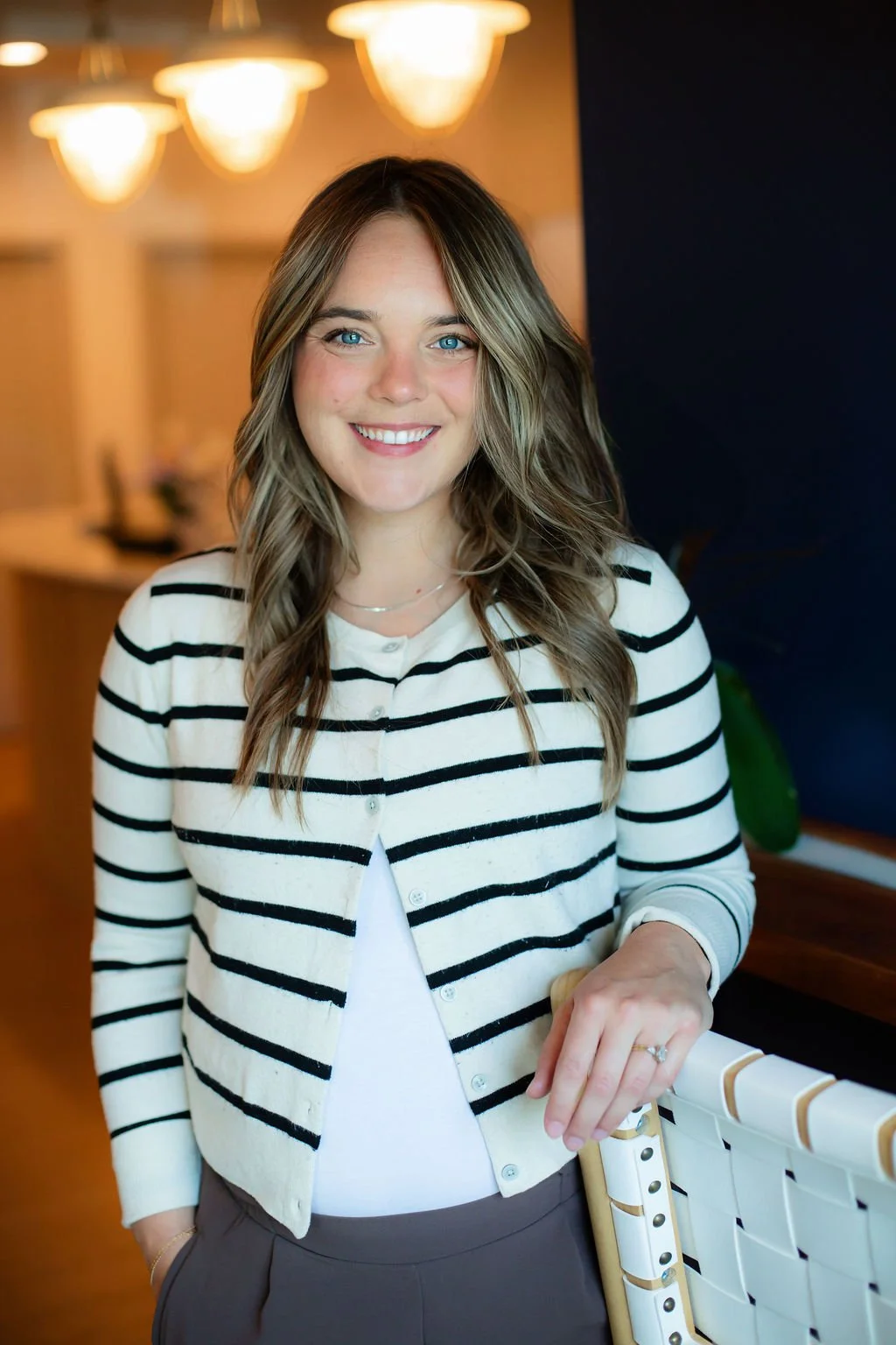 Lauren Brettingen Buttenhoff, DC associate chiropractor and twin mom specializing in pediatrics and pregnancy at family chiropractic clinics Lake Life Chiropractic and Be Well Chiropractic