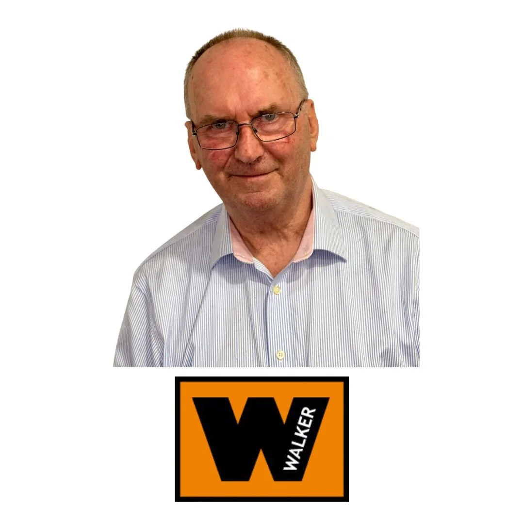 A man wearing glasses and a striped shirt, smiling, with a Walker logo below his image.