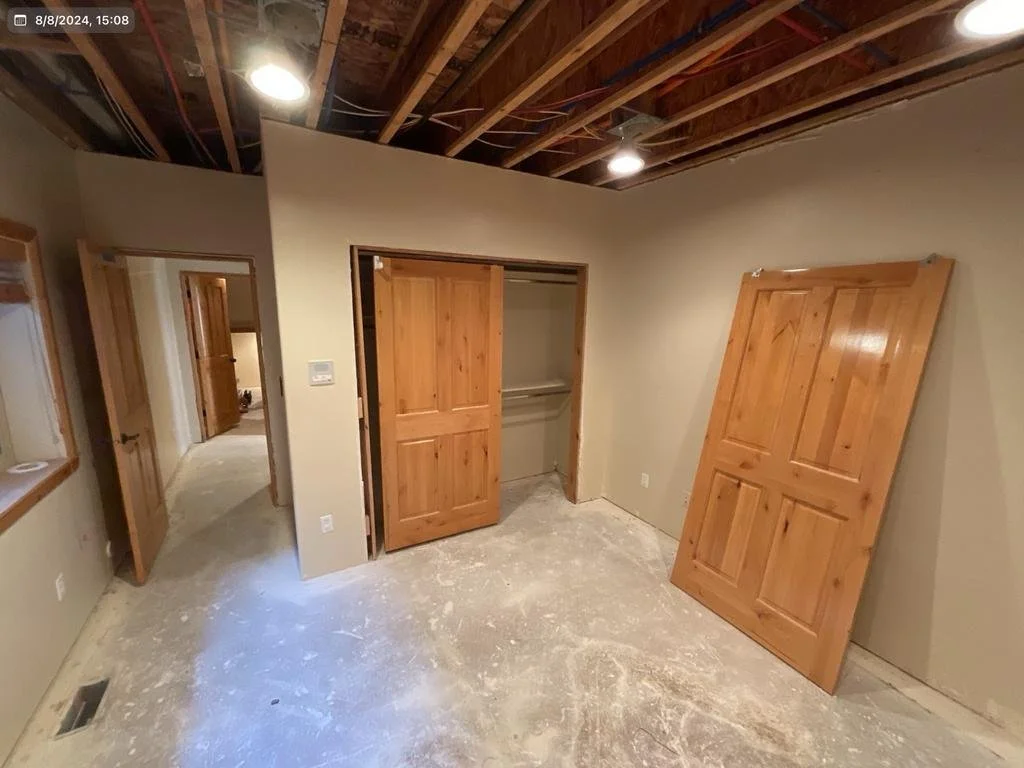 Before: Water Damaged ceilings, doors trim and floors in bedroom, – Huntsville, Utah VCON Restoration
