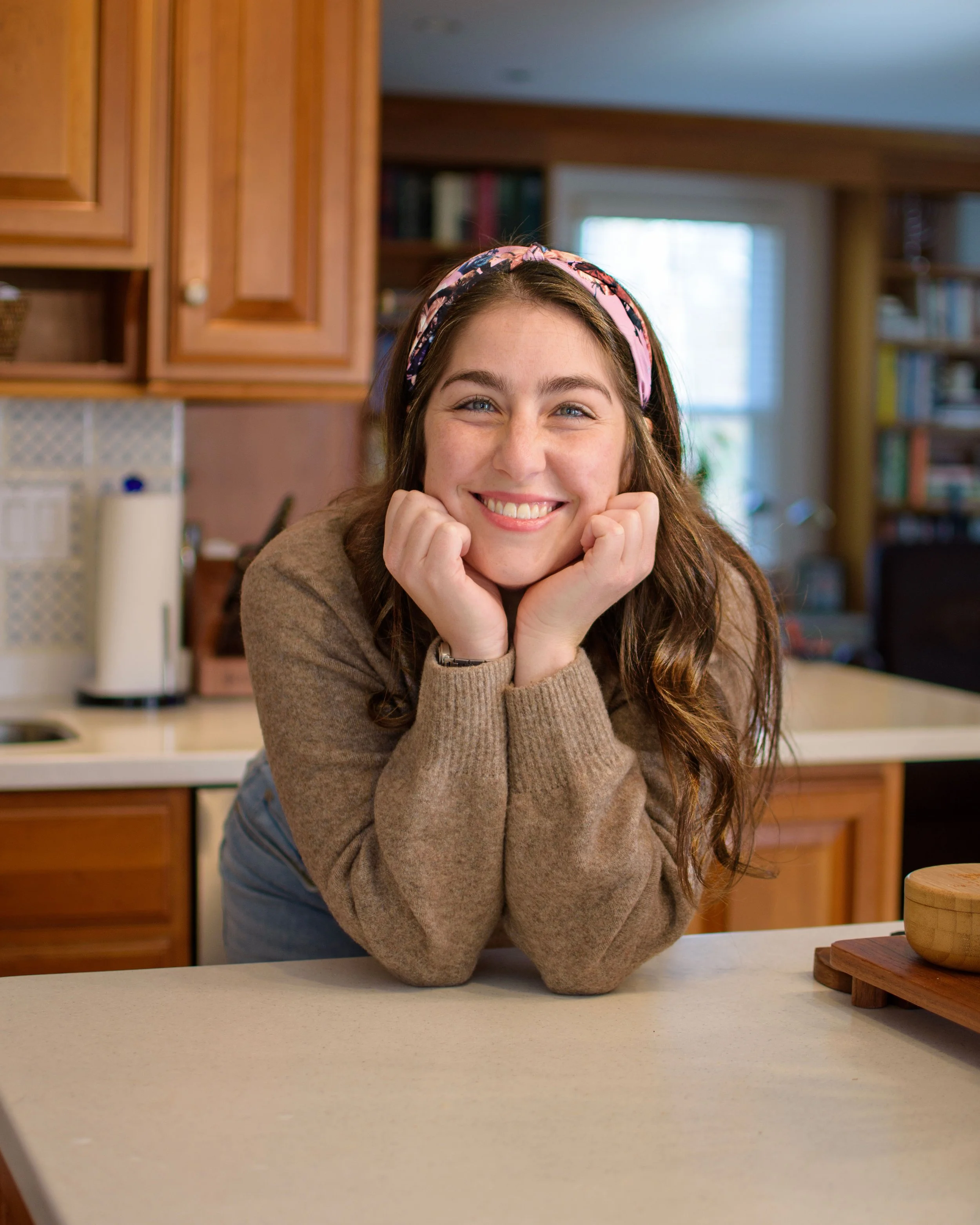 Sami Ginzberg Professional Organizer in kitchen with pink headband