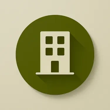 Graphic icon of a building inside a green circle.