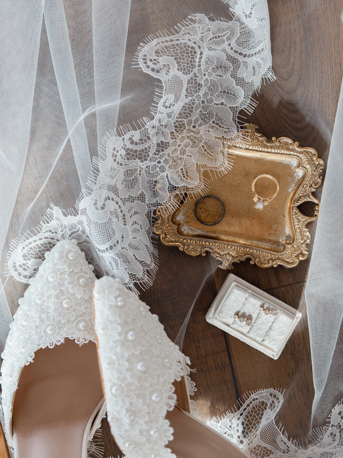 Details☁️🕊️

Photography @moments.with.morgang 
Coordinator @hitchstudio 
Venue @silvercreekeventssd 
Jewelry @winksjewelry 
Veil @eleven.elevenbridal 
Florals @thefloralshopmadison