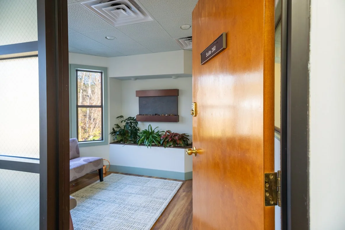 The door to Psychiatric Services & Consultation's waiting room is open