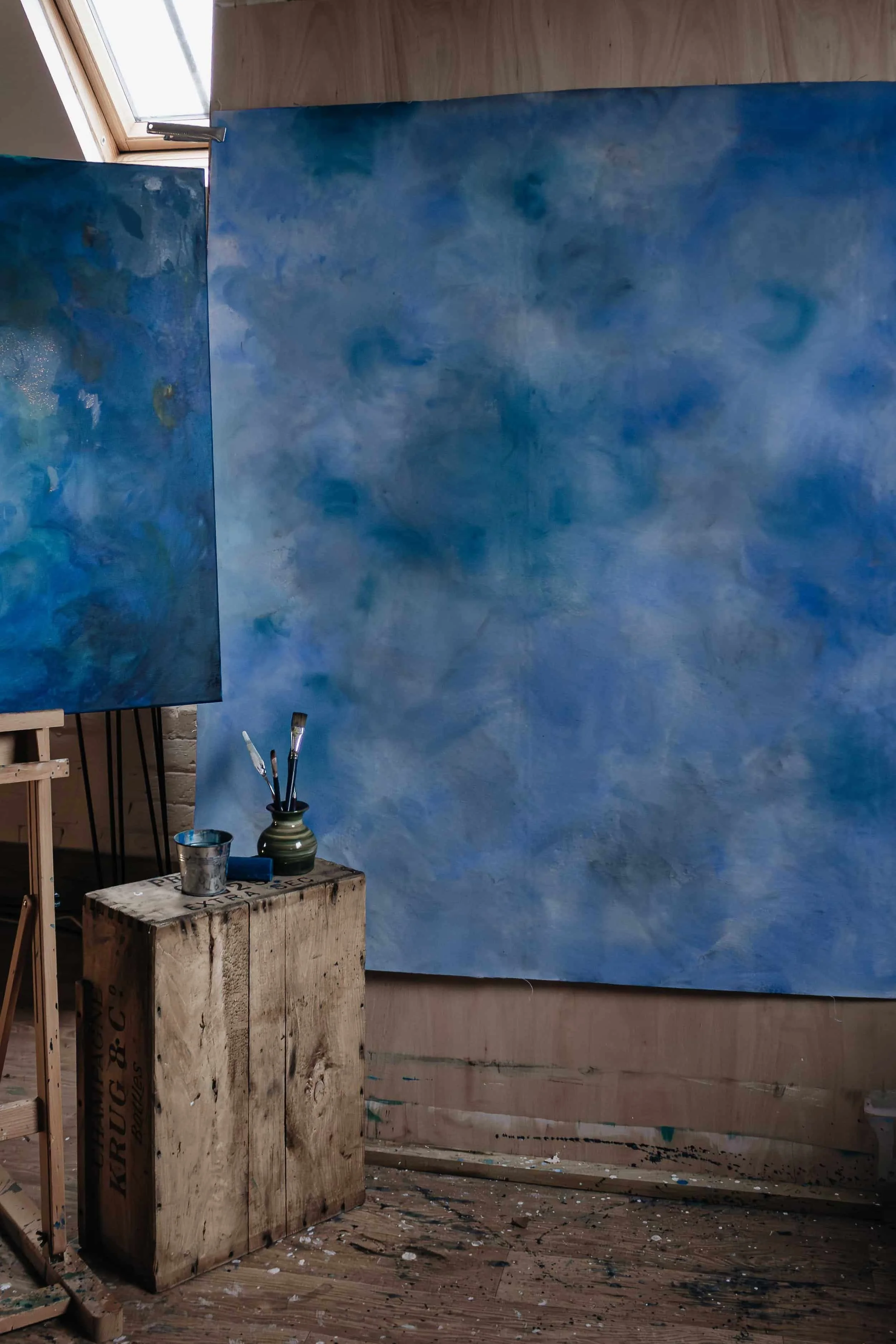 Sarah Pitt handpainted canvas backdrop in blue tones in her studio