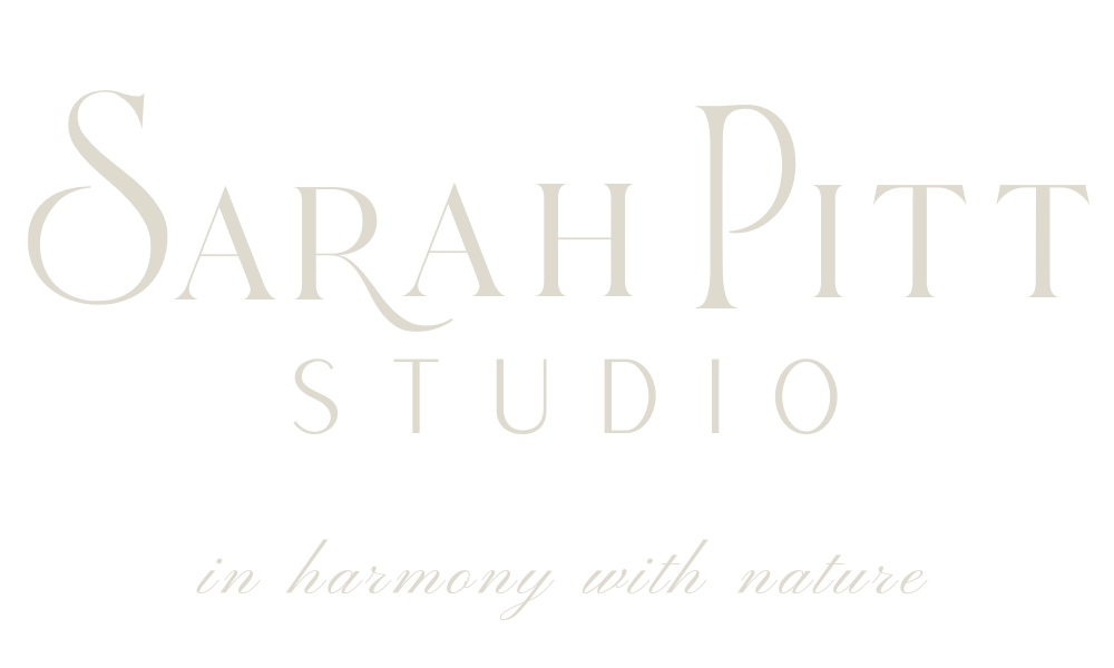 Sarah Pitt Studio brand logo in pale stone colourway against a a dark olive green background with the tag line in harmony with nature below