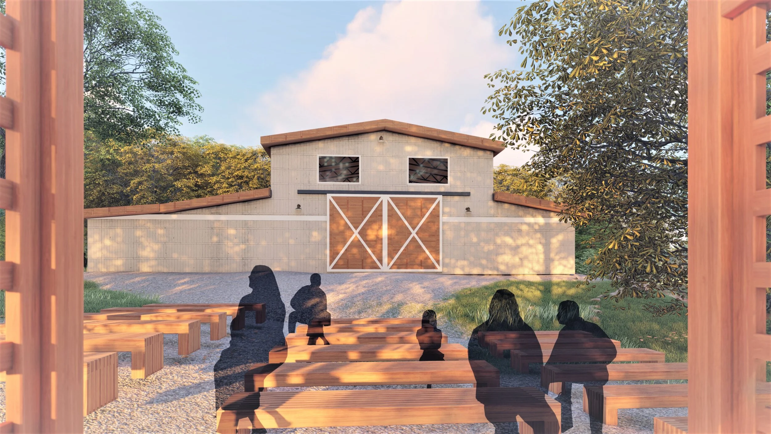 A view through a wooden fence showing a barn with sliding doors, two windows, and a sloped roof, with people sitting on benches in the foreground and trees in the background during sunset.