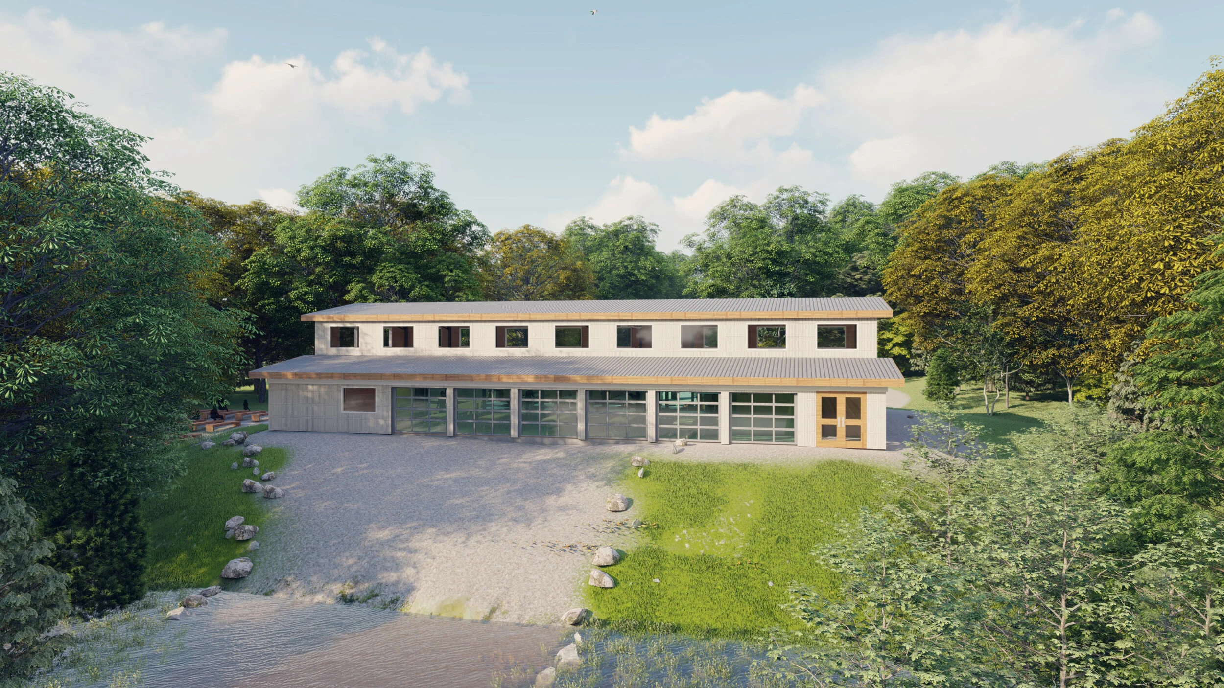 A modern, two-story house with large windows, beige exterior, and a metal roof, situated in a lush green landscape with trees, rocks, and a stream in the foreground, under a partly cloudy sky.