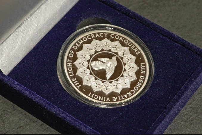 Obey 'Democracy In Focus' Sterling Silver Coin Available