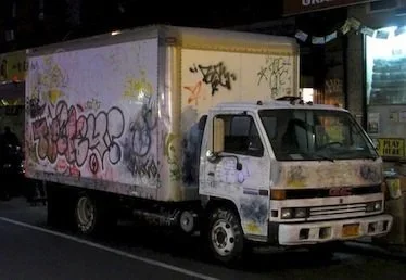 Banksy 'Mobile Garden' Graffiti Truck Found In New York City Includes Rainbow, Waterfall + Butterflies
