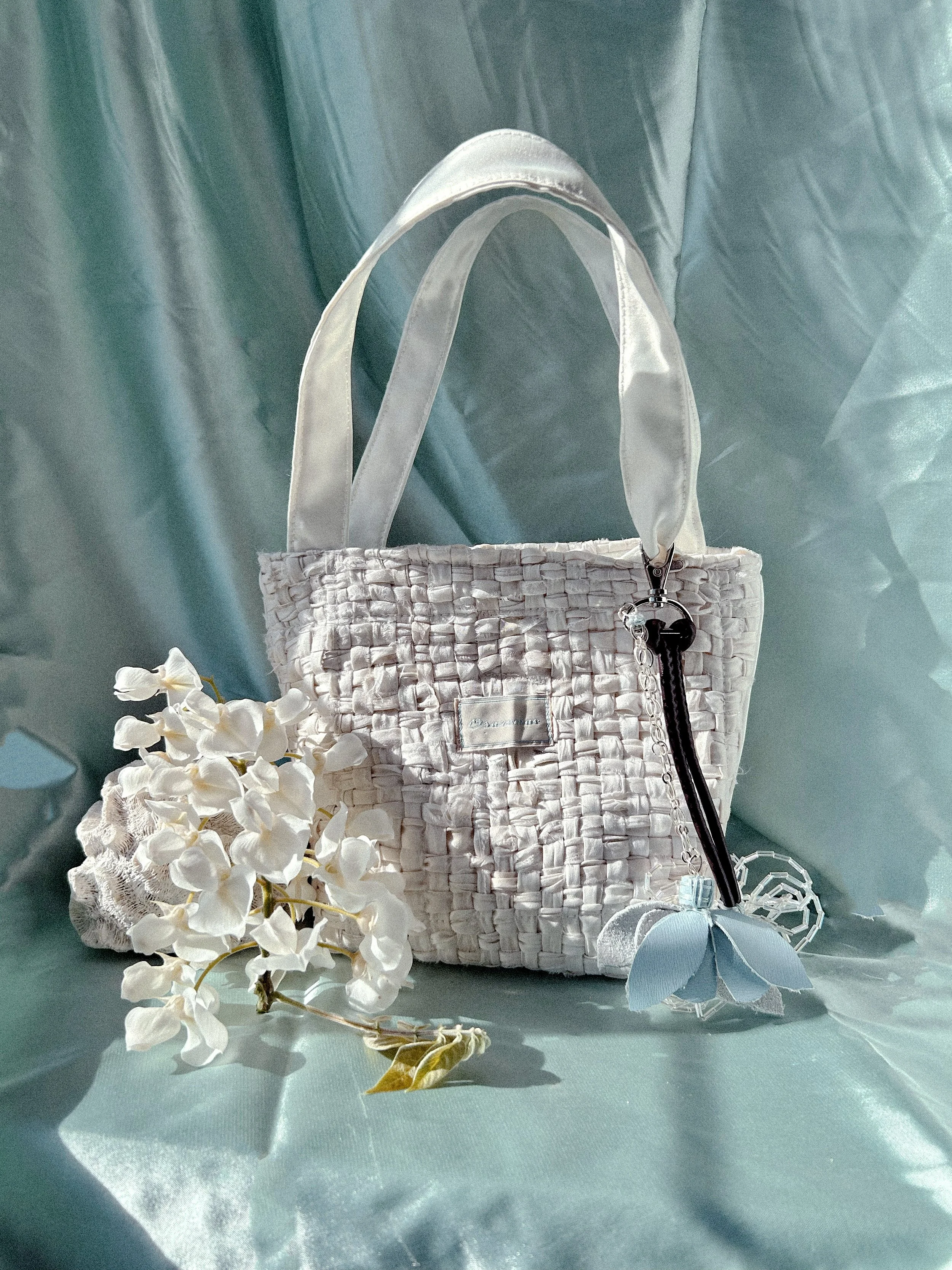 HAND MADE TEXTILES UPCYCLED WOVEN BAG WITH WISTERIA FLOWERS AND DELICATE KEYRING