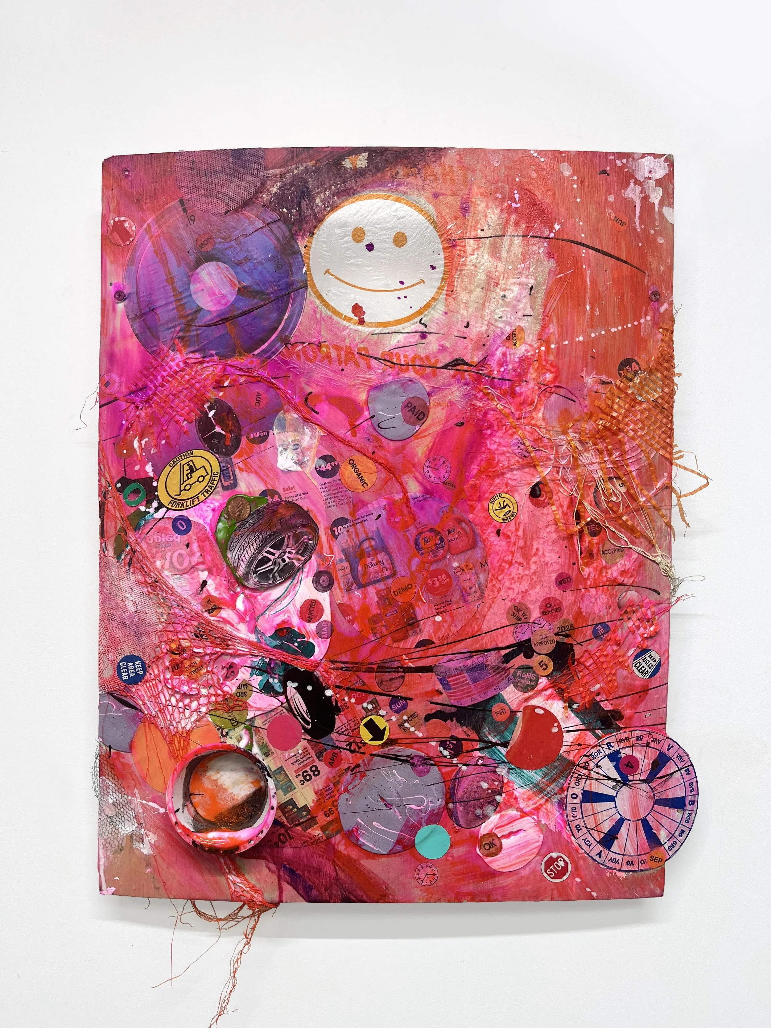 Mixed media artwork with a pink, red, and purple background containing various stickers, drawings, and abstract elements, including a large smiling face at the top center.