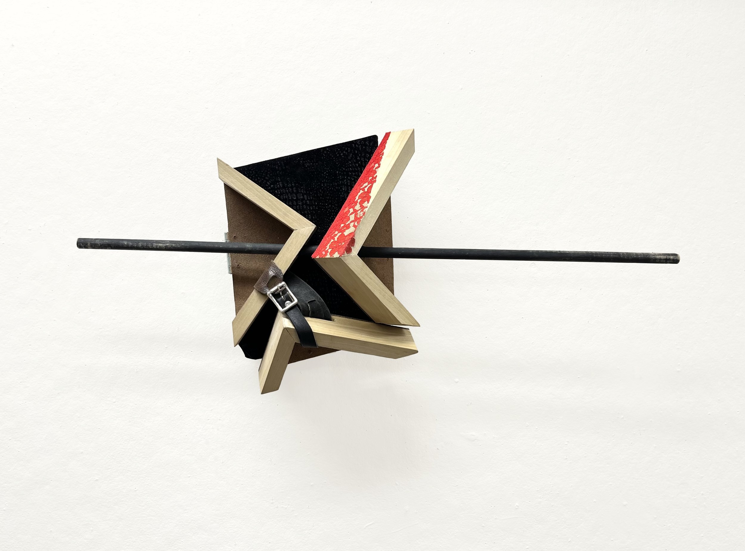 Magician's Assistant , 12 x 29 x 8.5 in., found fabric, lace, belt, hinges and wooden dowel on wood structure, 2025