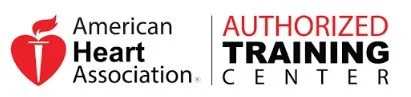 Logo for American Heart Association Authorized Training Center, featuring a red heart with a torch on top, and text in black and red.
