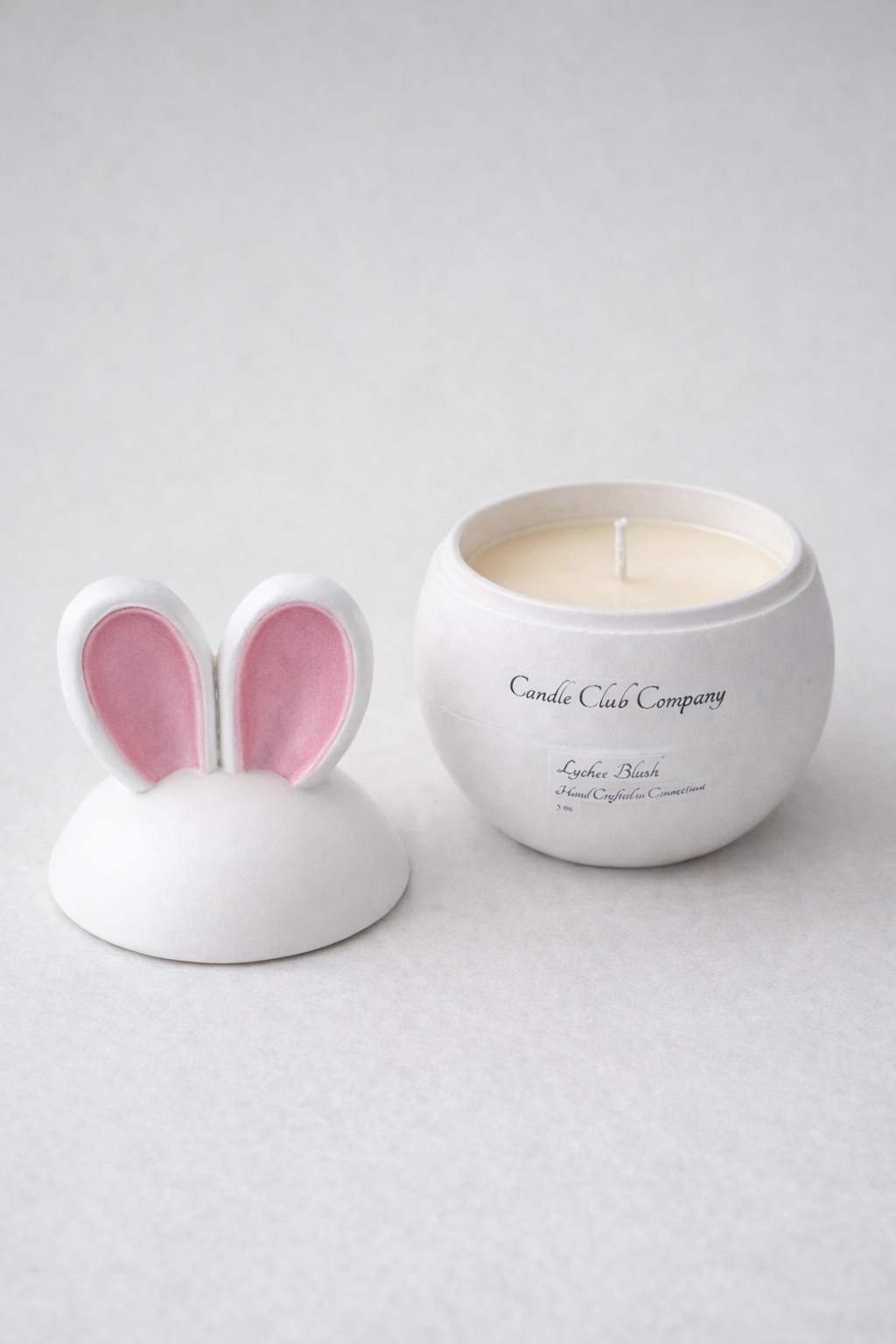 Handmade bunny egg soy candle with pink ears open lid, Easter decor gift made in Farmington Connecticut
