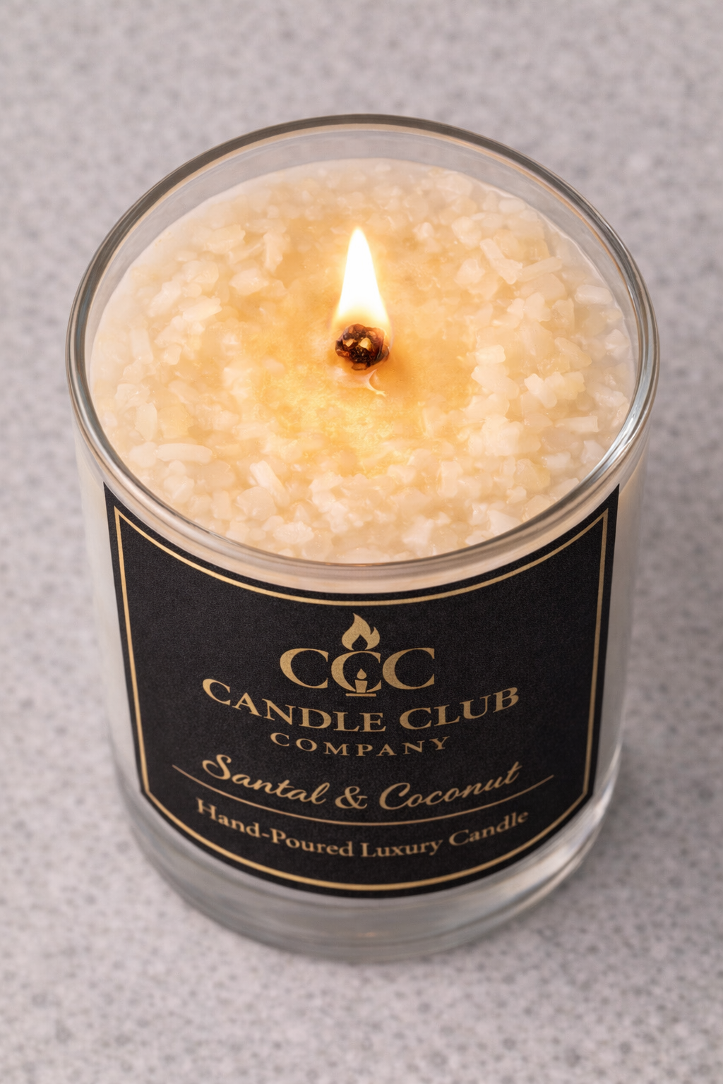 Top view of Santal & Coconut wooden wick soy candle showing crackling flame and textured wax by Candle Club Company