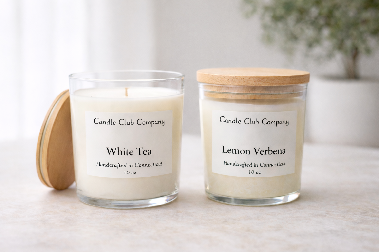 Handcrafted luxury soy candles in Amber and Lavender scents by Candle Club Company, clean-burning candles made in Connecticut with minimalist glass design.