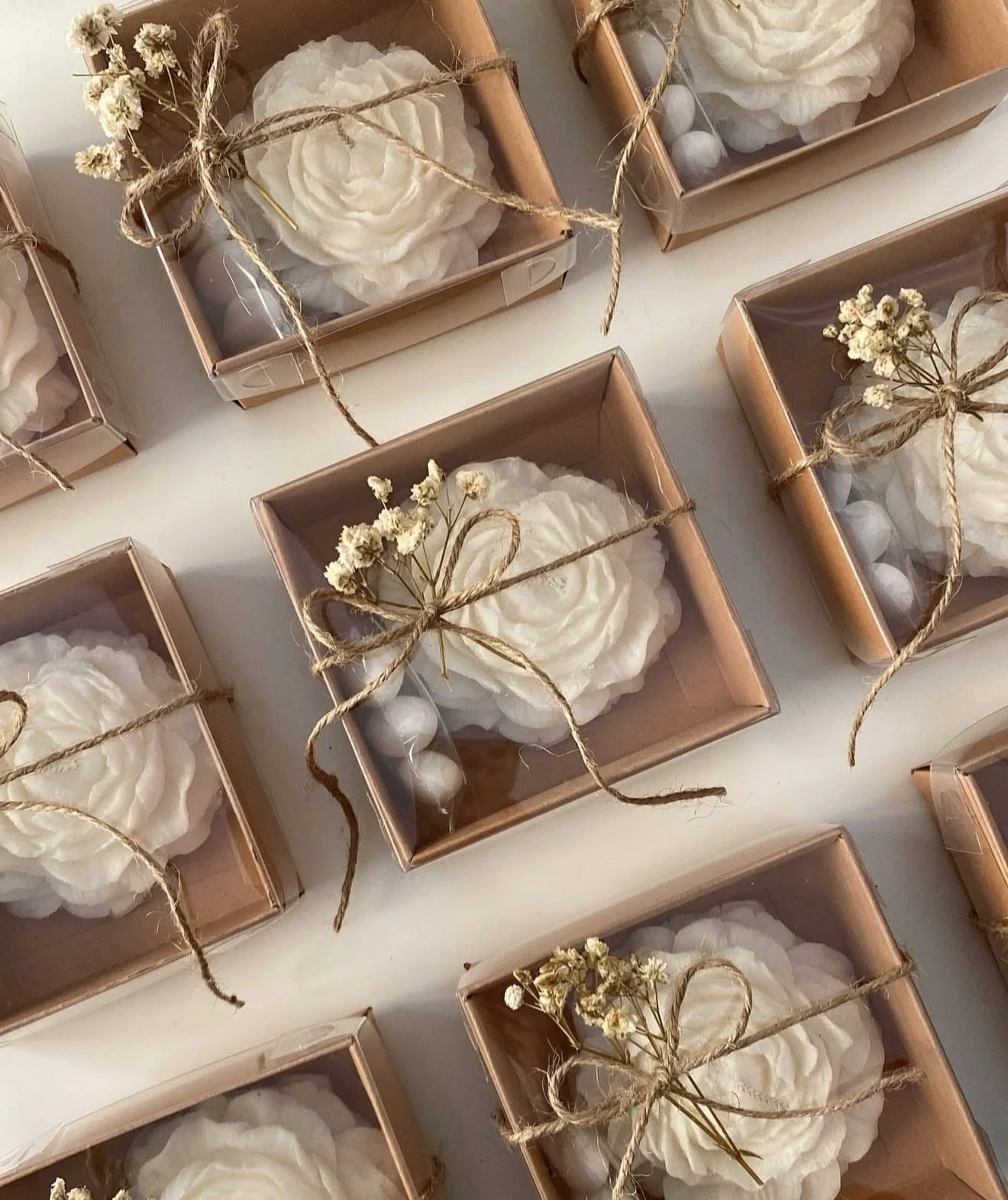 Handcrafted soy candle wedding favor gift boxes with white floral accents and decorative beads, custom bridal and baby shower favors by Candle Club Company, handmade in the USA.
