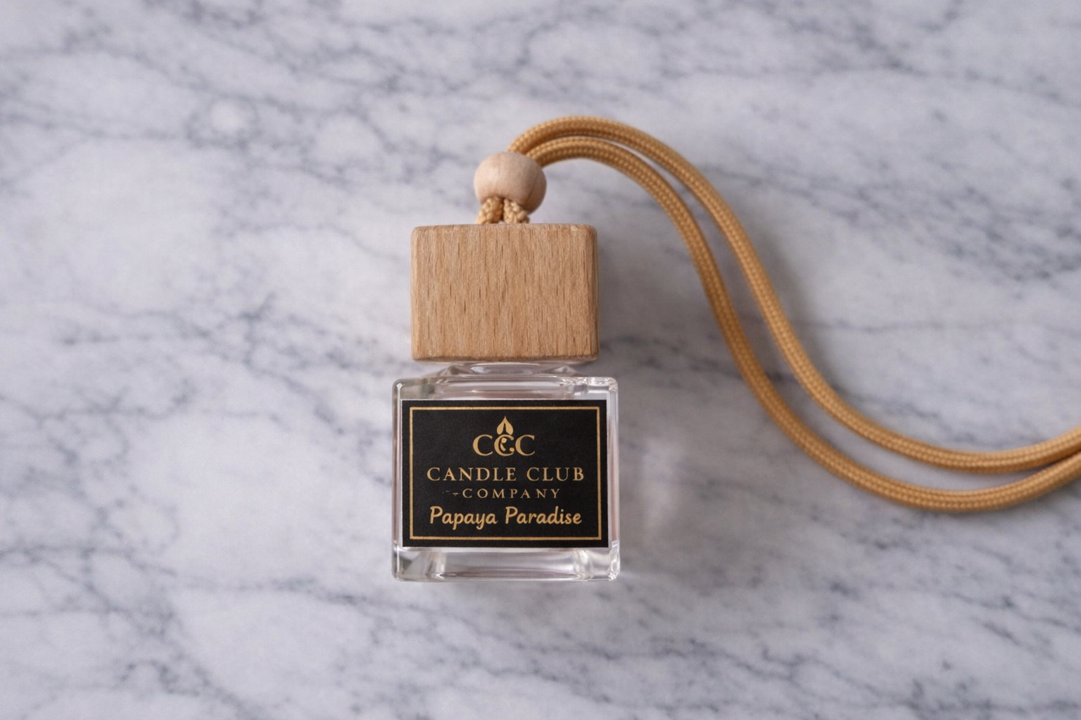 Stylish car air freshener diffuser with rope and wood top for vehicle interior