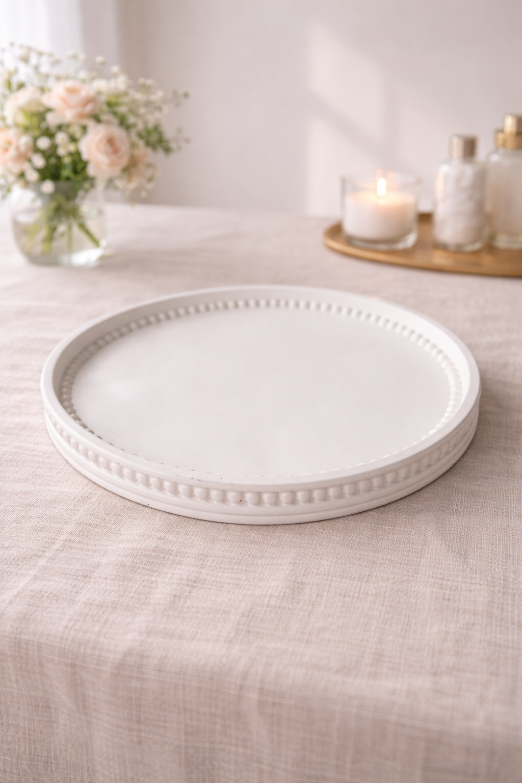 White candle display tray styled for modern home décor