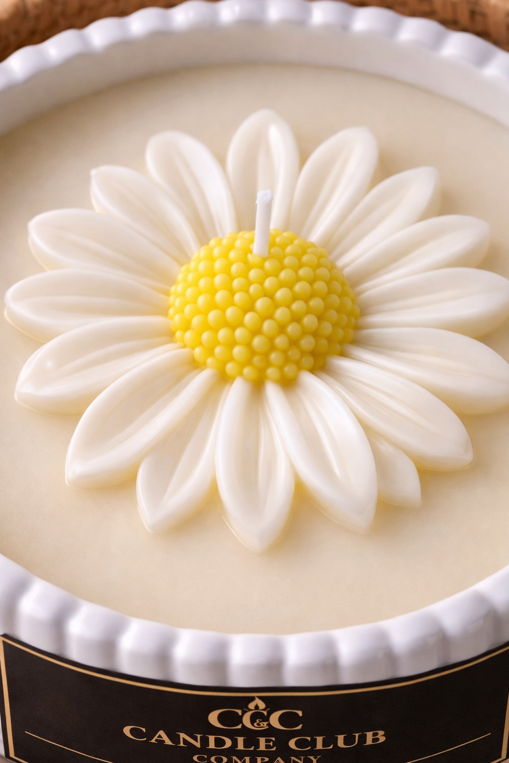 Hand-poured 8 oz soy candle with daisy flower design in white container for modern home décor