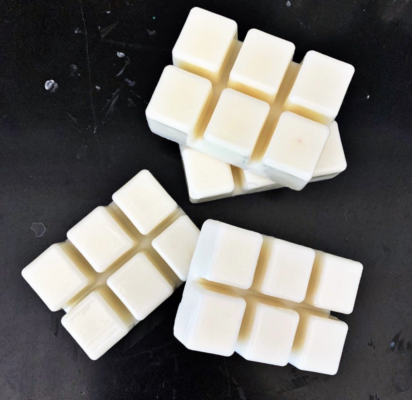 Non-toxic artisan wax melts with long-lasting scent throw