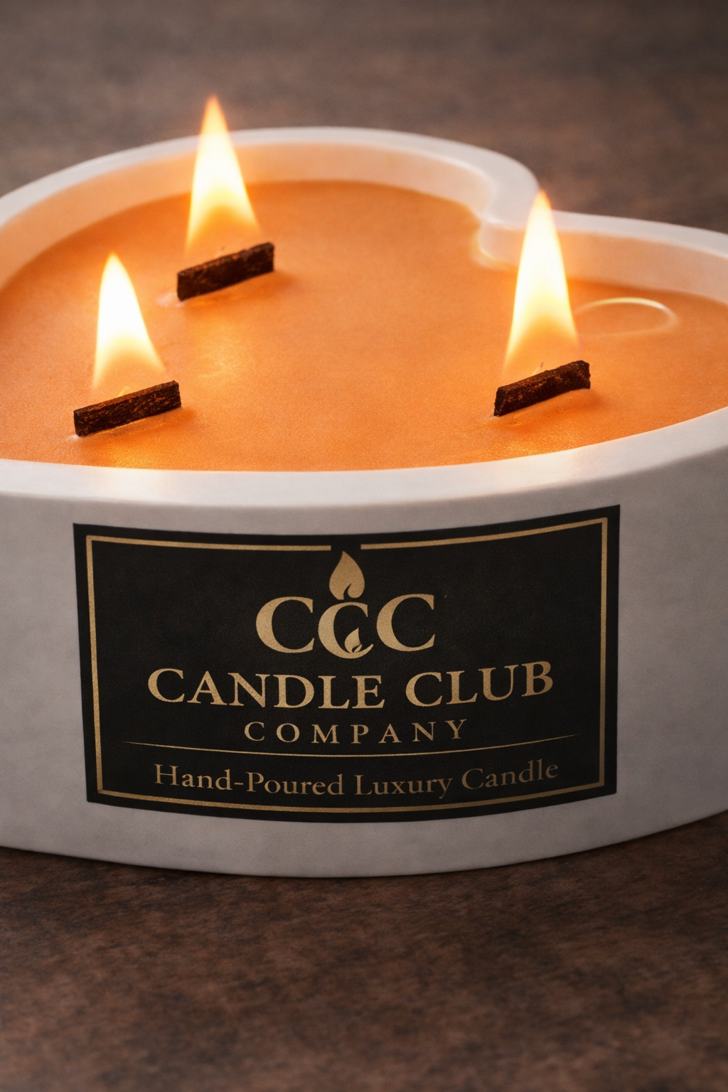 luxury heart shaped soy candle with triple wooden wicks burning close up