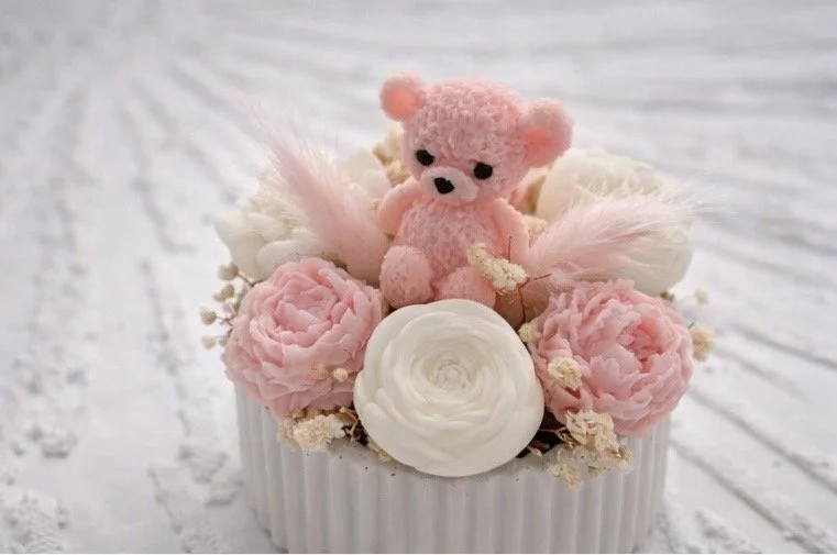 Boxed mini teddy bear floral candle favor with clear gift box, ribbon, and custom baby shower tag, handcrafted in Connecticut