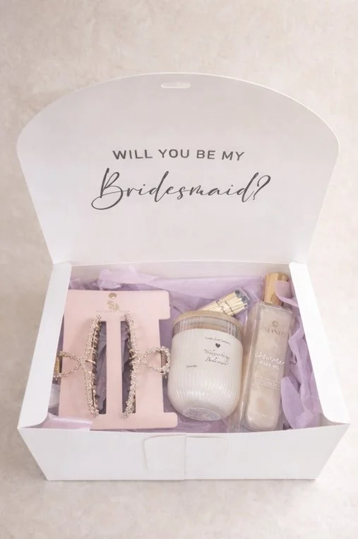 Maid of Honor proposal gift box with candle, matches, body oil, and bridal hair accessory curated by Candle Club Company