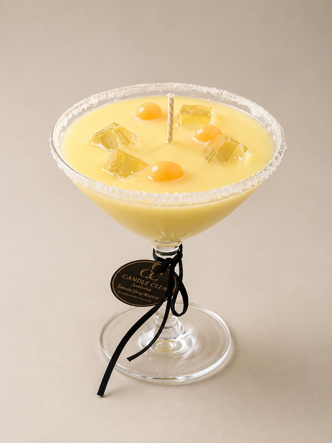 Close-up of Lemon Drop Martini candle with sugar rim, wax ice cubes, and handcrafted cocktail-inspired details