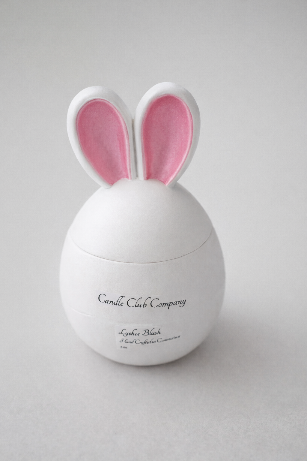 Luxury white bunny egg candle with blush pink ears handmade in Connecticut – 5 oz soy wax Easter decoration