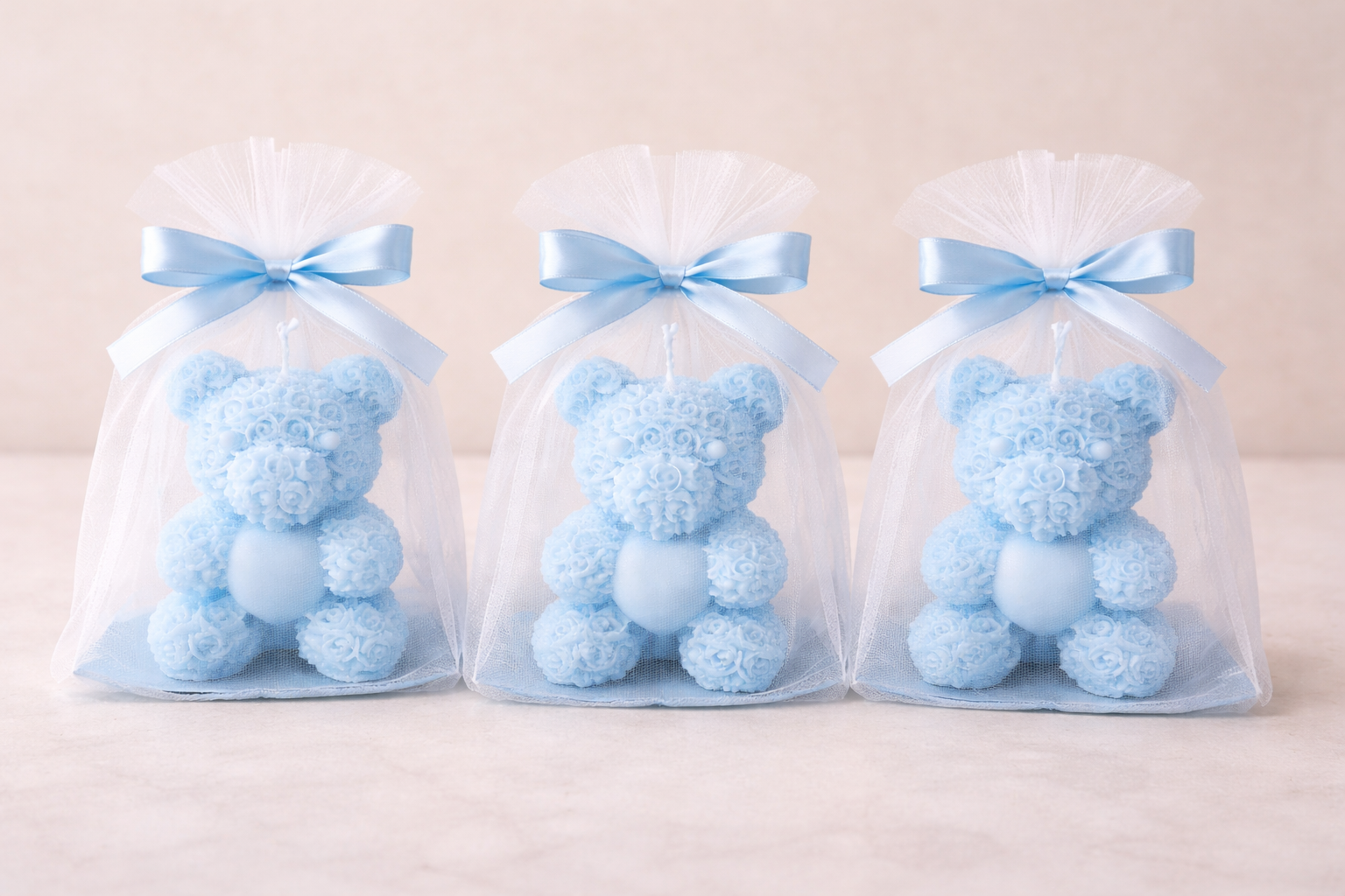 Blue teddy bear candle favors with Oh Baby tag